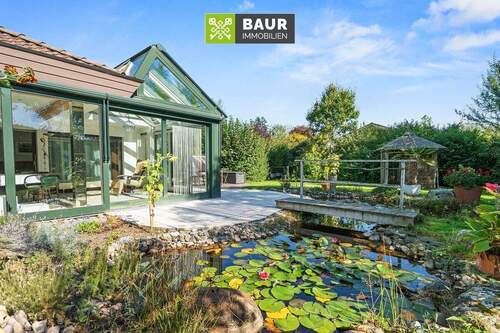 Titelbild - Gepflegter Bungalow in beliebter Wohnlage von Bad Waldsee - mit traumhaft angelegtem Grundstück