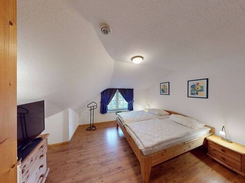 Schlafzimmer 1 im Dachgeschoss - 