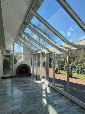 Wintergarten mit Kamin - 