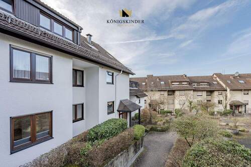 Ansicht - Renovierte 3,5-Zimmer-Wohnung mit Garten, Terrasse, Hobbyraum und TG-Stellplatz