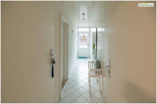 Hauseingangsflur - Mehrfamilienhaus, Wohnhaus mit 121,00 m&sup2; in Glückstadt zum Kaufen
