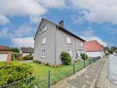 Seitenansicht - 1 Zimmer Mehrfamilienhaus, Wohnhaus zum Kaufen in Harpstedt