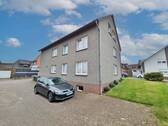 Rückansicht - 1 Zimmer Mehrfamilienhaus, Wohnhaus in Harpstedt