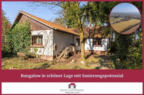 Ärzte & Apotheker Immobilien - Bungalow in schöner Lage mit Sanierungspotenzial