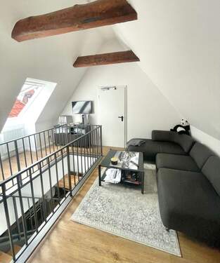 Wohnzimmer - Schmuckstück über 2 Ebenen in der Stader Innenstadt zu vermieten.