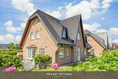 Bild 1 - Großzügige Erdgeschoss Wohnung mit Südterrasse im Herzen von Wenningstedt