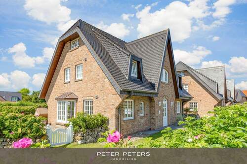 Bild 1 - Großzügige Erdgeschoss Wohnung mit Südterrasse im Herzen von Wenningstedt