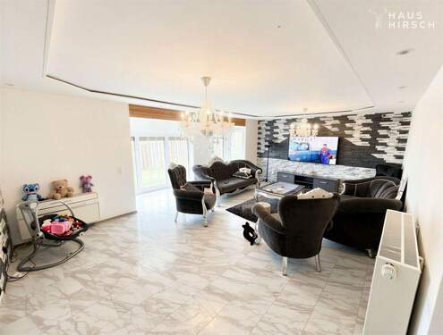 Wohnzimmer und Wintergarten im EG - 