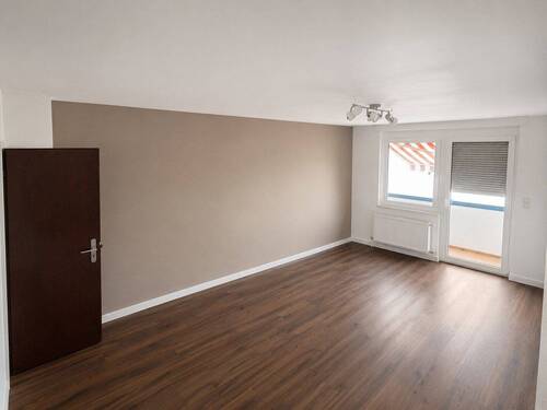 Wohnzimmer mit Westbalkon - 