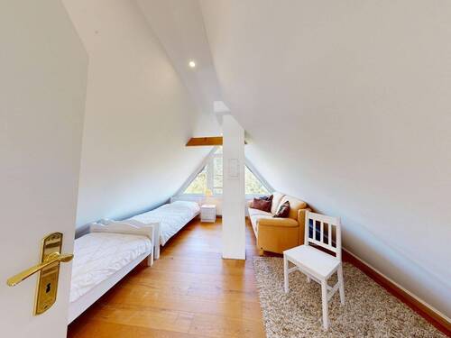 Schlafzimmer im Spitzboden - Wohnung 4 - 