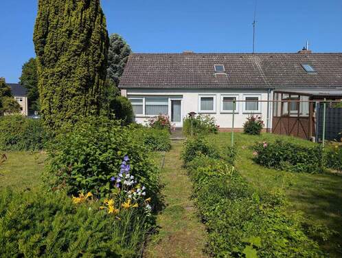 Haus vom Garten aus - Gemütliches Haus mit Ausbaumöglichkeit und tollem Garten