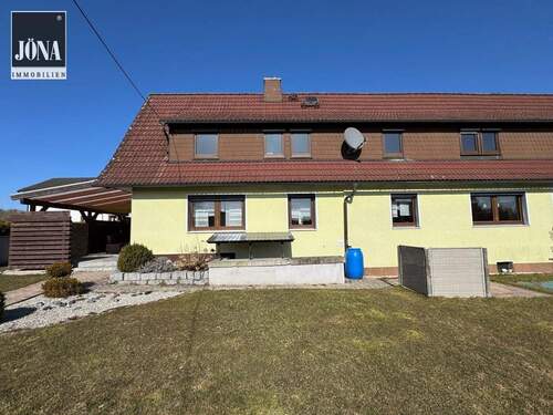 Bild 1 - Charmant sanierte Wohnimmobilie mit großem Garten und Doppelgarage in einem angenehm ruhigen Umfeld