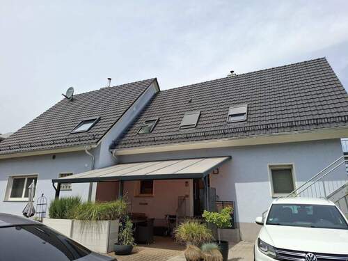 Eingang Erdegeschosswohnung und Freisitz - Mehrfamilienhaus, Wohnhaus mit 265,00 m² in Schutterwald zum Kaufen