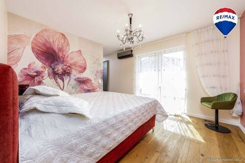 RE/MAX Immobilien Merzig-Perl Schlafzimmer - 