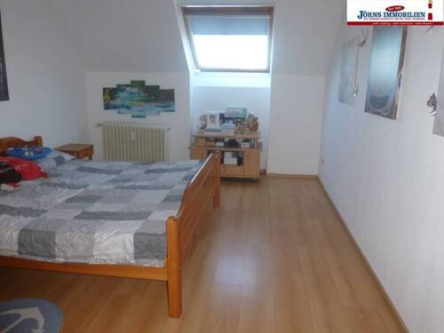 Schlafzimmer - 2 Zimmer Etagenwohnung in Fehmarn OT Burg