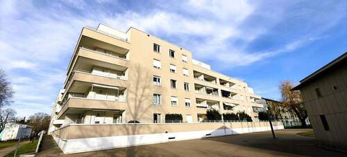 Außenansicht - Moderne 2-Zimmer-Erdgeschosswohnung mit einladender Terrasse. Ideal für Ihr neues Zuhause!