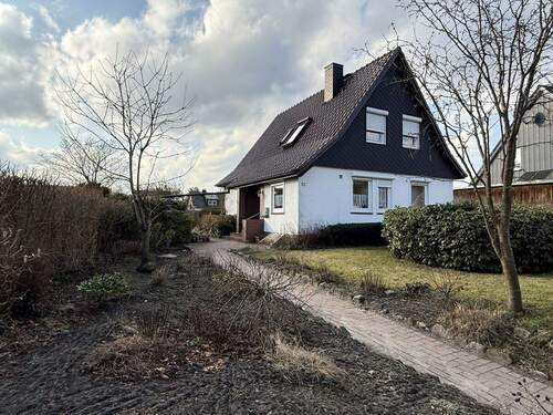 Strassenansicht - 5 Zimmer Einfamilienhaus zum Kaufen in Quickborn