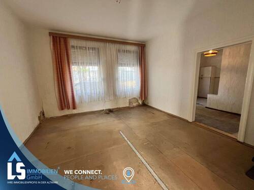 Wohnzimmer - Reihenmittelhaus mit 127,60 m² in Tangermünde zum Kaufen