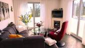 Wohnzimmer mit E-Kamin - 