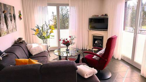 Wohnzimmer mit E-Kamin - 