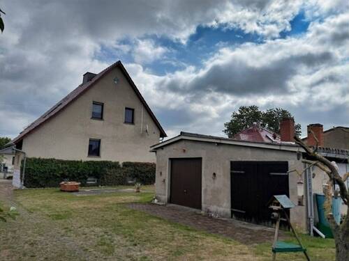 Garagen - Einfamilienhaus mit 115,00 m² in Brück zum Kaufen
