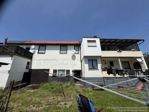 Hausansicht - Ihre Chance auf eine sichere und vielseitige Investition - mit zusätzlichem Entwicklungspotenzial!