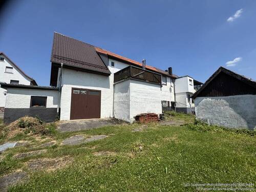 Hausansicht - Mehrfamilienhaus, Wohnhaus mit 300,00 m&sup2; in Pforzheim / Huchenfeld zum Kaufen