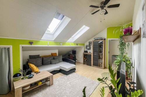 Wohnzimmer - Etagenwohnung mit 88,90 m² in Unterneukirchen zum Kaufen