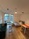 Wohnbereich - Sofort einziehen - modern möblierte 1-Zimmer-Wohnung