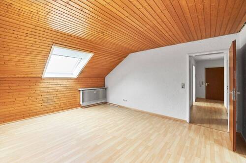 1_Wohnzimmer - Gemütliche 2-Zimmer-Dachgeschoßwohnung in 79211 Denzlingen