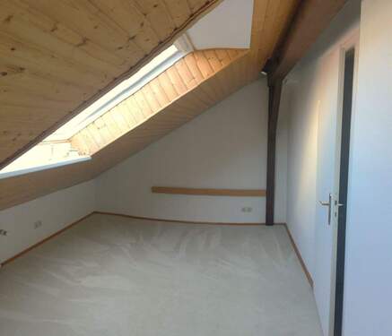 Zimmer im Dachgeschoss - 