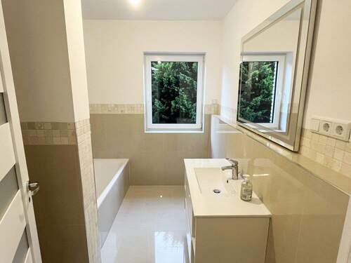 Badezimmer EG - Einfamilienhaus mit 177,20 m&sup2; in Greven zum Kaufen