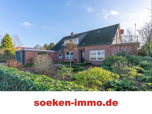 1. Hauptbild - Wohnen mit Weitblick: Modernisiertes Haus mit Wintergarten und Traumgrundstück in Großefehn *TU2507*