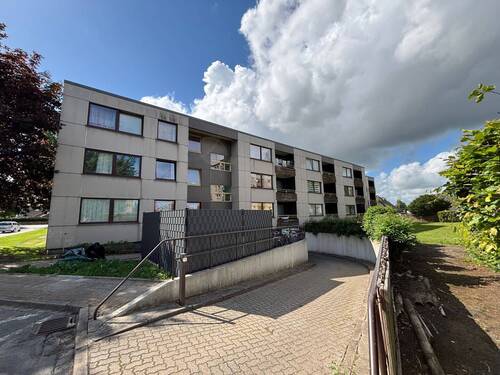 Hausvorderansicht - Vermietete 2-Zimmer-Eigentumswohnung in Husum (6%er)
