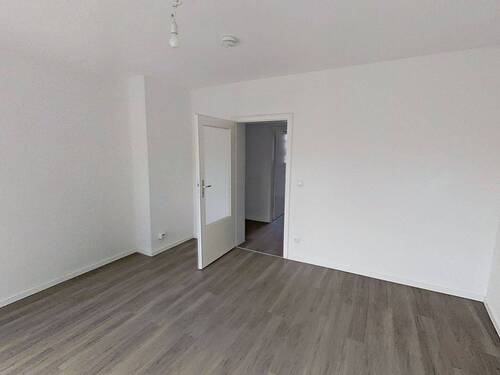 Ansicht III: Wohn- und Esszimmer - 2 Zimmer Etagenwohnung in Duisburg