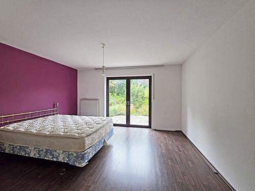 Schlafzimmer mit Terrassenzugang - Einfamilienhaus mit 110,00 m&sup2; in Starnberg / Hadorf zum Kaufen