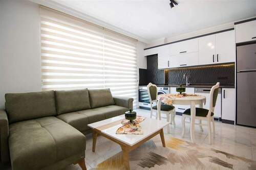 1 (1) - 3 Zimmer Etagenwohnung in Alanya