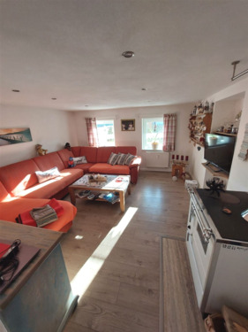 Wohnzimmer in der EG- Wohnung - 