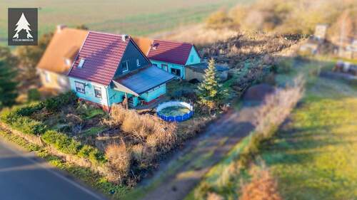 Luftbild - Doppelhaushälfte mit 95,00 m&sup2; in Frose zum Kaufen