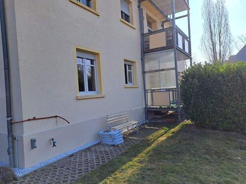 Rückseite mit Balkon - 3 Zimmer Etagenwohnung zum Kaufen in Leuna