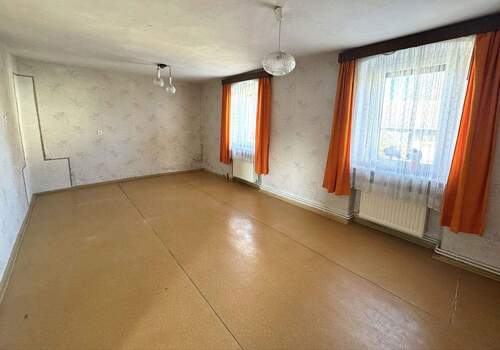 Wohnzimmer - 5 Zimmer Einfamilienhaus zum Kaufen in Wiedemar