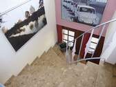 Treppe von der Wohnebene ins Sockelgeschoss - 