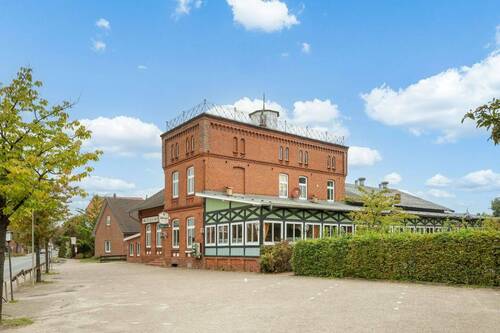 Seitenasicht - 1 Zimmer Mehrfamilienhaus, Wohnhaus zum Kaufen in Grünendeich