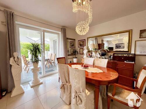 Essbereich mit Blick in den Garten - Bungalow mit 109,90 m² in Holte Lastrup zum Kaufen