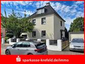 Front - Freistehendes Zweifamilienhaus mit Garage