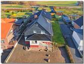 Titel - 9 Zimmer Mehrfamilienhaus, Wohnhaus zum Kaufen in Hofgeismar / Hombressen