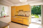 Küche mit Terrassenzugang - 