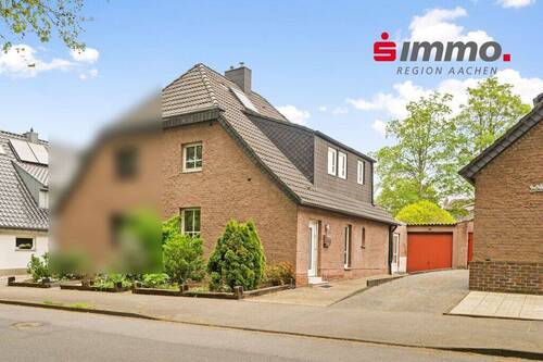 Front_1 - Ruhig gelegene DHH mit Wintergarten, Garage und Garten