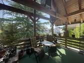 Balkon-Loggia mit Blick in den Garten - 