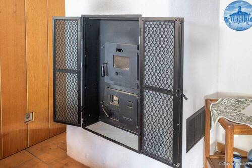 Befeuerung des Kaminofens im UG - 